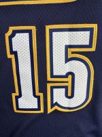 Detalle del número 15 bordado de la camiseta NBA Denver Nuggets Nikola Jokić City Edition